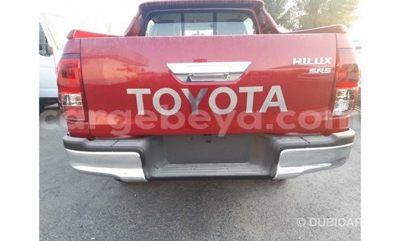 Imported Toyota Hilux Red Makiinaa iti Import - Dubai keessatti Ethiopia keessatti Imported Toyota Hilux Red Makiinaa iti Import - Dubai keessatti Ethiopia keessatti