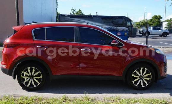 Acheter Import Voiture Kia Sportage Rouge à Ādīgrat, Ethiopie Acheter Import Voiture Kia Sportage Rouge à Ādīgrat, Ethiopie