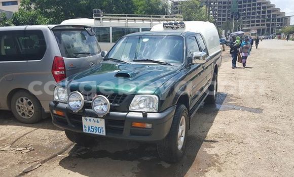 Oofamaa Mitsubishi Carisma Black Makiinaa iti Addis–Ababa keessatti Ethiopia keessatti Oofamaa Mitsubishi Carisma Black Makiinaa iti Addis–Ababa keessatti Ethiopia keessatti